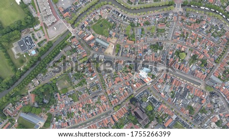 Amazing Holland aerial background with green fields and villages