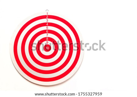The dartboard is striped red and white on a white background with a copy of the space.
