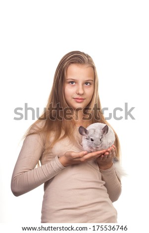 Girl and chinchilla isolated on white