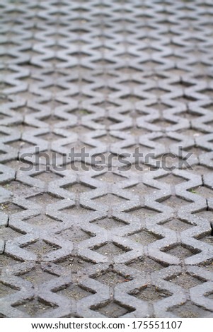Close up photo of grey paving in the city 