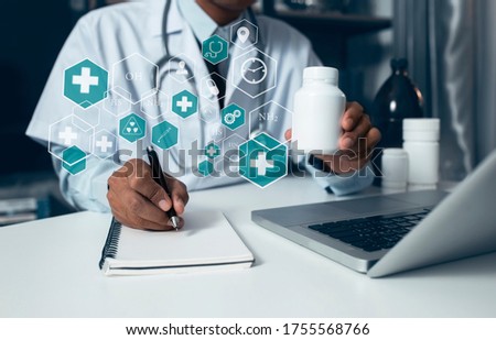 Double exposure of healthcare And Medicine concept. Doctor and modern virtual screen interface. selective focus.