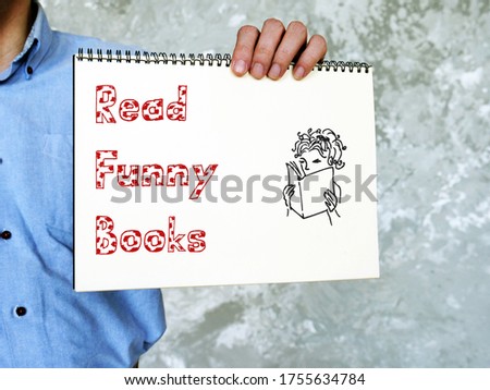 Motivation concept meaning Read Funny Books with sign on the page.