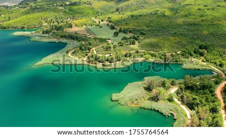 Aerial drone panoramic photo of beautiful nature in artificial lake and dam of Marathonas or Marathon that feeds drinking water supply to Athens, Attica, Greece