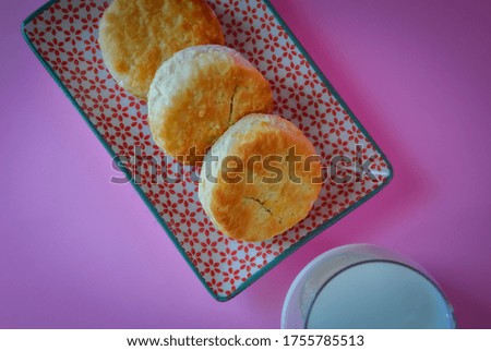 Top view of biscuits and glass of milk 
