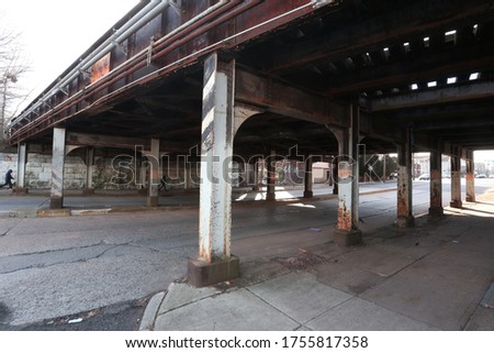 A bridge in an urban low income area of NJ.  Royalty-Free Stock Photo #1755817358