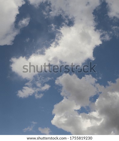 Cumulus clouds with blue sky background