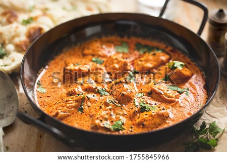 Chicken curry, creamy chicken butter  Royalty-Free Stock Photo #1755845966