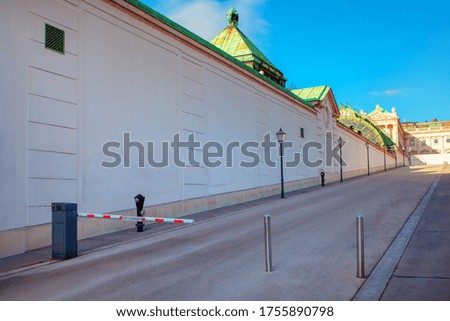 Vienna street with a barrier , walking along the city wall
