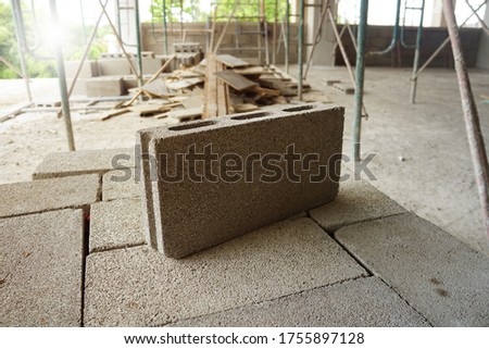 Concrete block, cinder blocks, breeze blocks, Cement blocks on construction site. Royalty-Free Stock Photo #1755897128