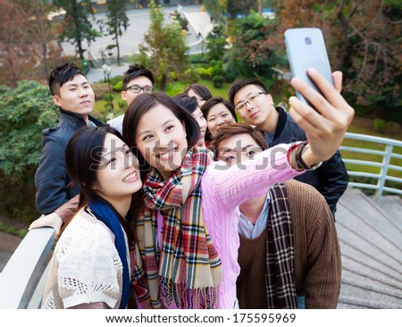 Group of people taking photo themselves