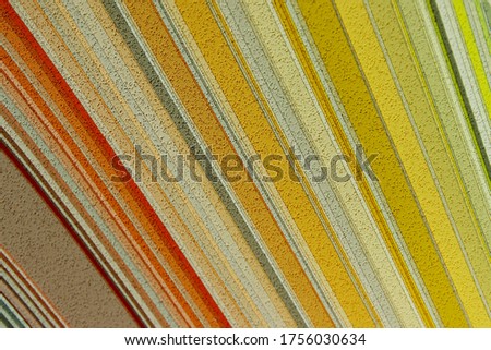 Blurry image of abstract texture background, yellow colors. Palette of yellow shades, striped view.