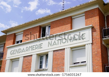 gendarmerie nationale is french military police with text sign logo in building office