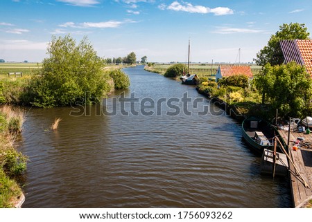 The Netherlands a wet country full of ditches and canals, sailing boats and vast plains with grassland, photos taken in Friesland Gaasterland region