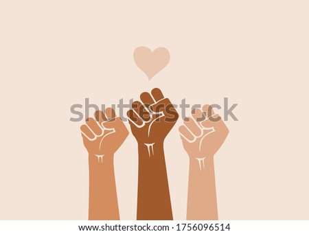 People's hands raised with clenched fists, isolated on a light background. Symbol of love and diversity. Human rights, feminism, equality and women's day concept. Black lives matter movement.  Royalty-Free Stock Photo #1756096514