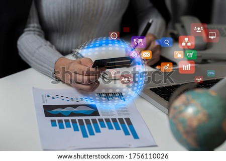 Businesswomen hands holding credit card for online shopping with social network icons. internet digital marketing.