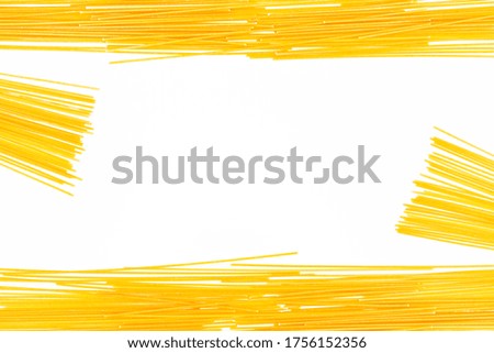 A frame made of pasta spaghetti, isolated on a white background with protruding noodles on the sides.