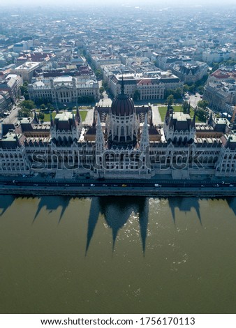 Aerial footage of Parliament of Budapest, Hungarian parliament building on the riverside of Danube. Orszaghaz, Budapest city, Hungary, Europe. Summer. Neo gothic architecture. Travel destination