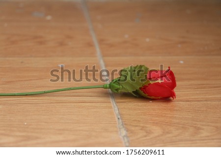 Red rose made from plastic. Take pictures from the side.
