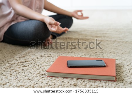 woman break time pose Yoga meditation and turn off mobile phone and disconnect internet  Royalty-Free Stock Photo #1756333115