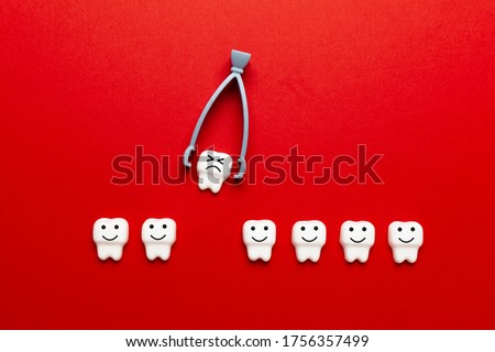 Baby tooth extraction. Surgery of children's teeth, concept.