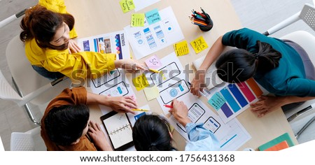 Brainstorm planing creative asian teamwork, Group of asia mobile phone app developer team meeting for ideas about screen display prototype smartphone layout, ux startup small business, top view Royalty-Free Stock Photo #1756431368