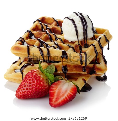 Belgium waffles with chocolate sauce, ice cream and strawberries isolated on white background Royalty-Free Stock Photo #175651259