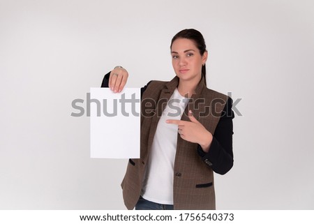 young business woman showing blank sign board, over studio background isolated