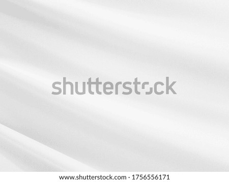 White silk satin background smooth texture background. The fabric is a light gray shining wave.