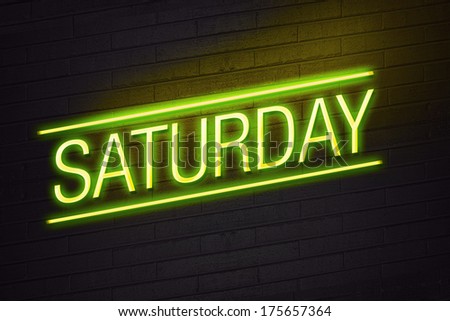 Saturday neon sign glowing on club wall