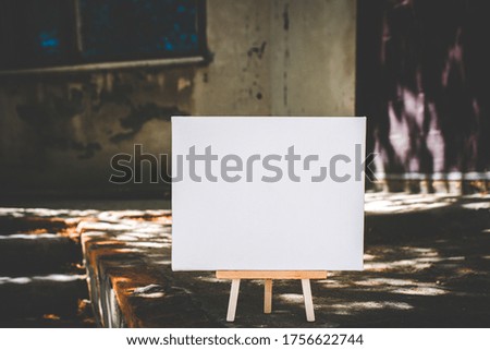 White empty mockup template poster canvas painting on stone and concrete background