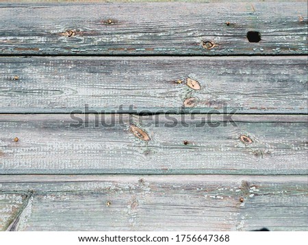 Texture wall of horizontal boards with peeling paint