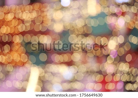 Blur Abstract bokeh of Christmas light decoration background.