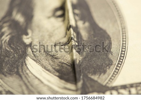 selective focus of crumpled dollar banknote