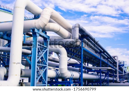 Pipeline and pipe rack of petroleum industrial plant. Offshore Industry oil and gas production petroleum pipeline. Royalty-Free Stock Photo #1756690799