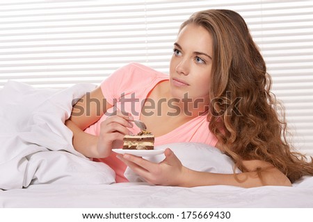 Portrait of a beautiful young woman waking up in the morning
