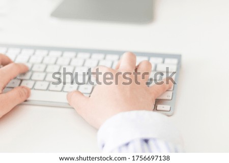 Close Up, Caucasian woman's hands typing on a wireless keyboard. Concepts, selective focus