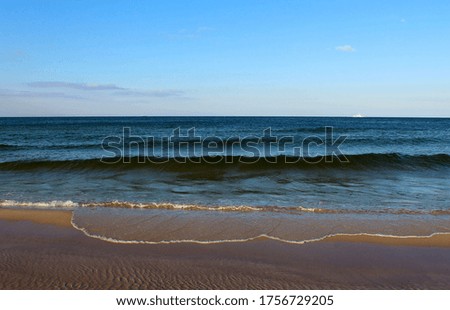 Baltic Sea in sunny summer evening. Polish seaside in peninsula Hel, Poland.