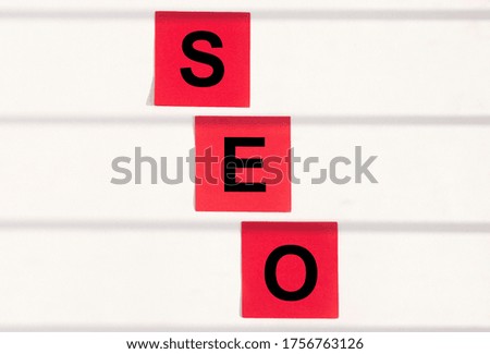 SEO Search Engine Optimization acronym on red sticky notes
