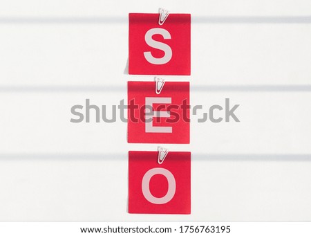 SEO Search Engine Optimization acronym on red sticky notes