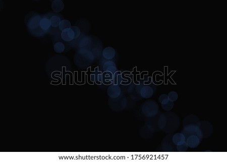 Abstract glitter bokeh defocused lights background
