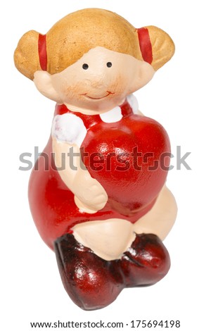 Porcelain girl decoration holding a heart