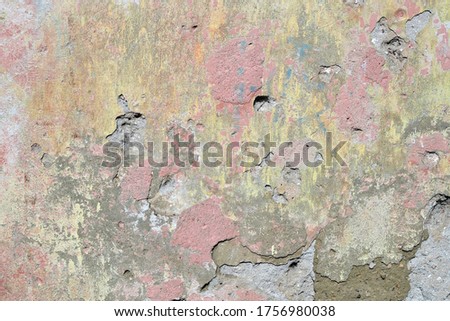 Old wall with peeling stucco. 