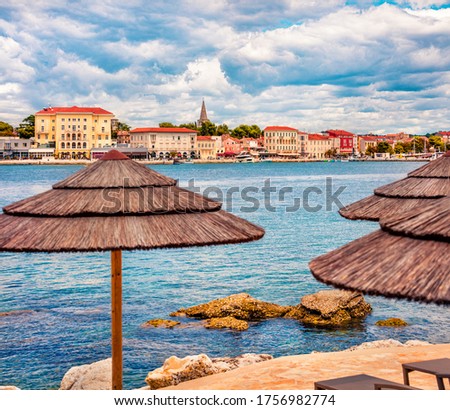Sunny morning view of popular summer resort Porec. Colorful seascape of Adriatic Sea. Bright scene of Istrian Peninsula in western Croatia, Europe. Vacation concept background. 
