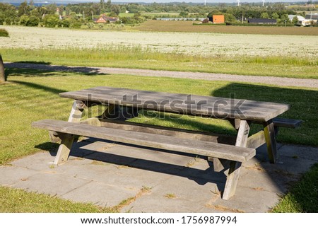 old bench with nobody in the summer
