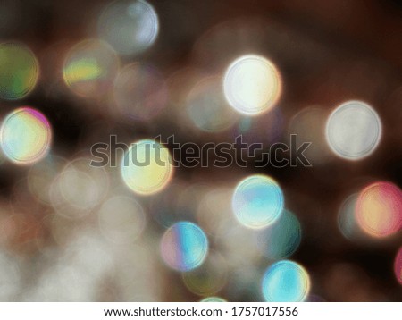 Defocused bubbles on the sun lit surface of a fresh brewed coffee. Bokeh abstract background.