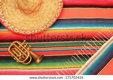 Mexican fiesta poncho sombrero mariachi fiesta rug background in bright colours with copy space flatlay minimal simple minimalist flat layout stock, photo, photograph, image, picture
