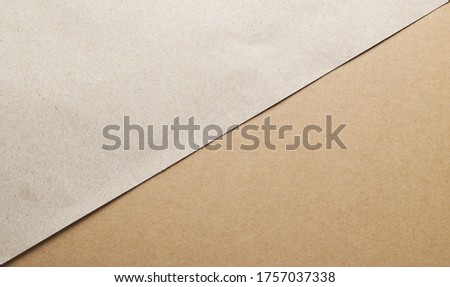 Brown recycled carton paper sheets close up. Business concept