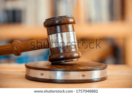 Judge gavel on the wooden