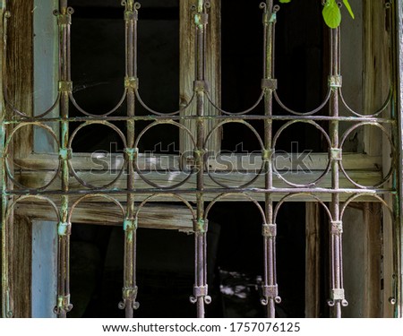 
Iron railing of an old window without welding