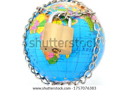 Earth locked with chain and padlock on white background